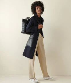 Cole Haan Small Grand Ambition Puff Quilted Leather Convertible Backpack -Kurt Geiger Shop 00000000 zi ead573ce 8efc 4c15 81e4 7e7055dbb32f 03 ai